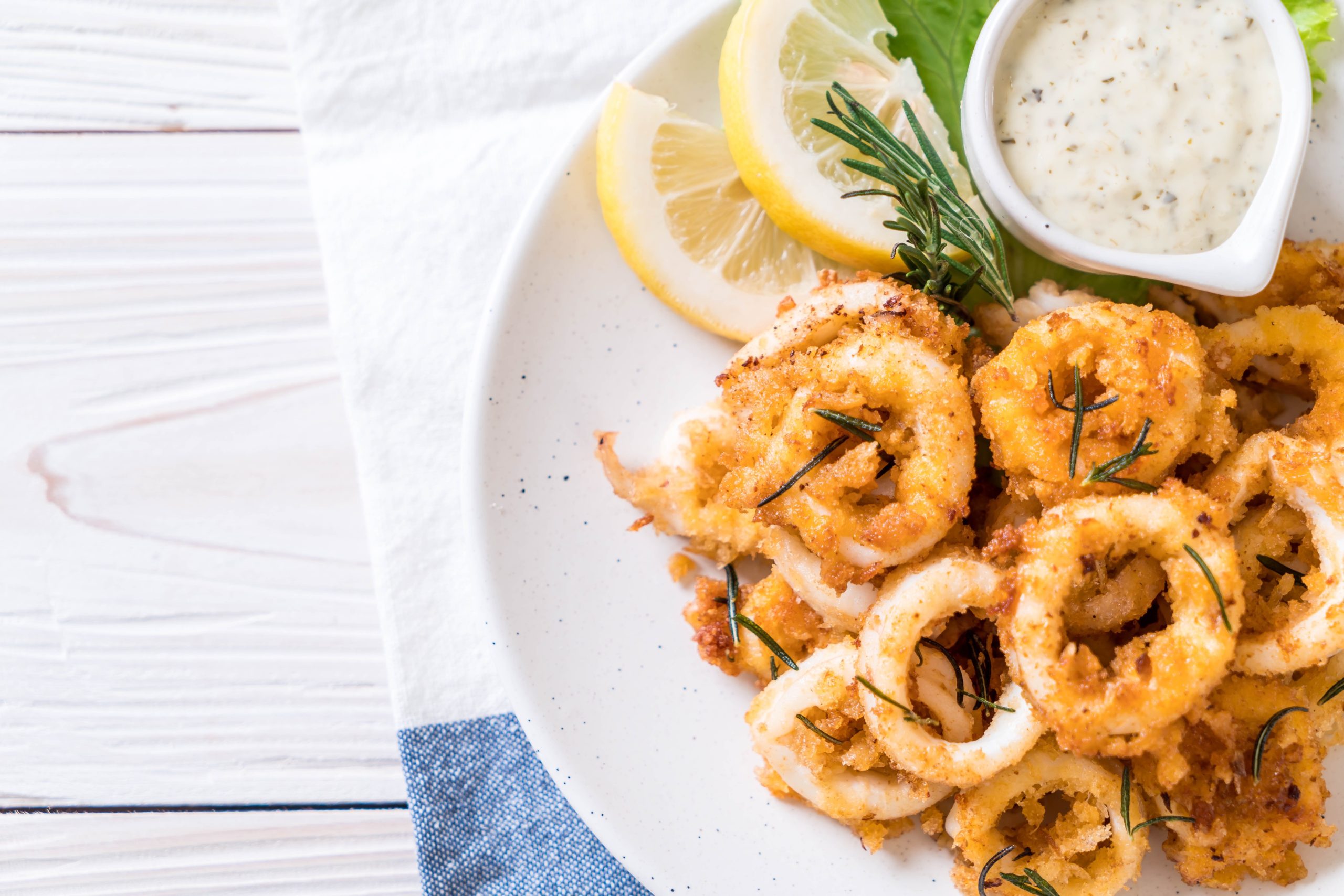 Fried,Squids,Or,Octopus,(calamari),With,Sauce,-,Unhealthy,Foods