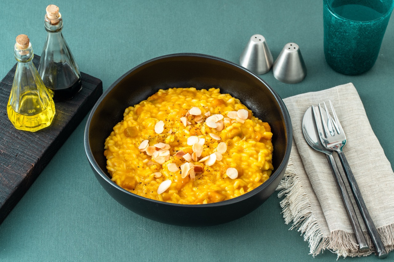 Risotto alla zucca con scaglie di mandorle tostate